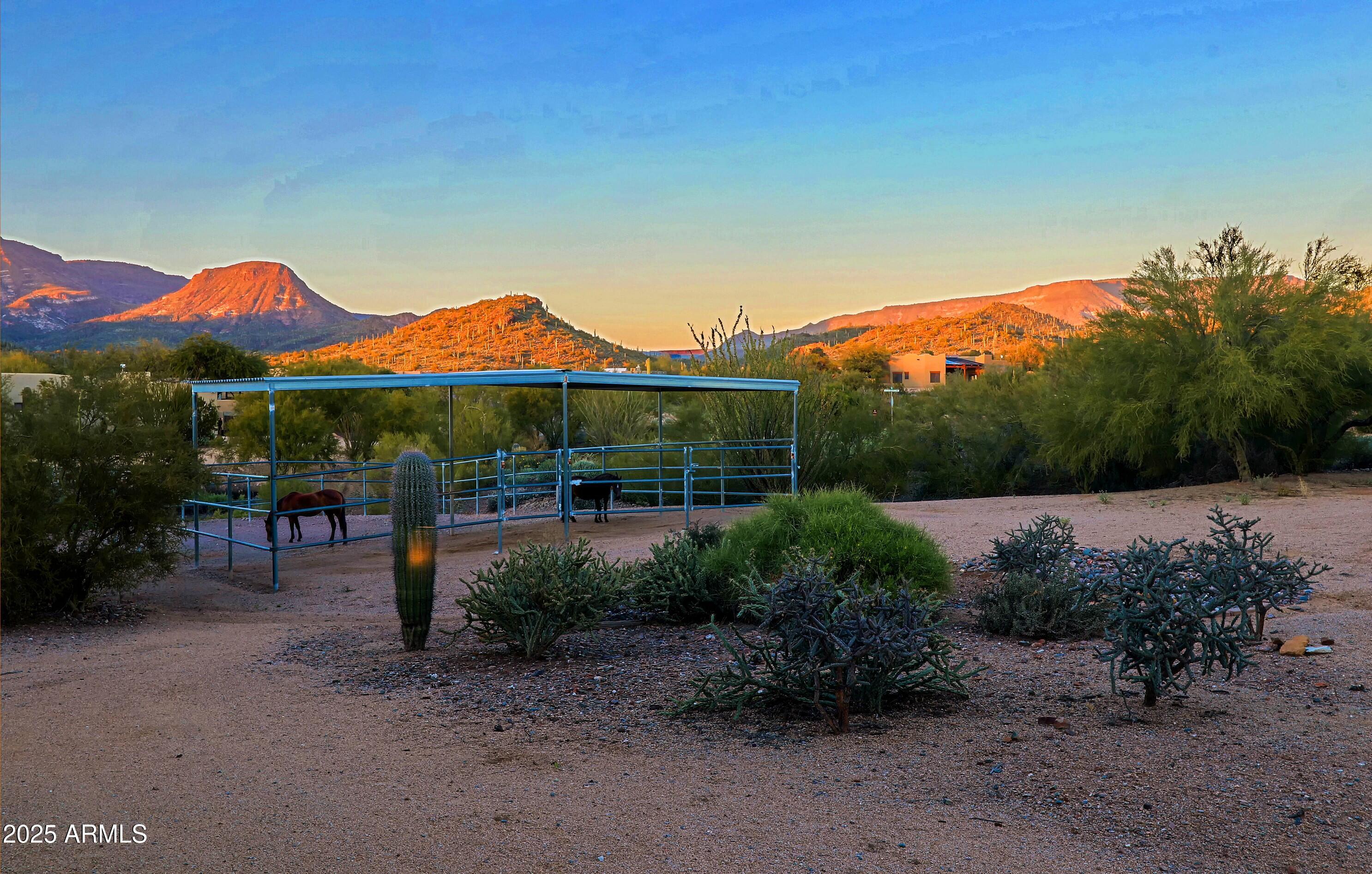 41840 North Spur Cross Road Cave Creek, AZ 85331 - Photo 55 of 67 a view of a house with a yard and sitting area