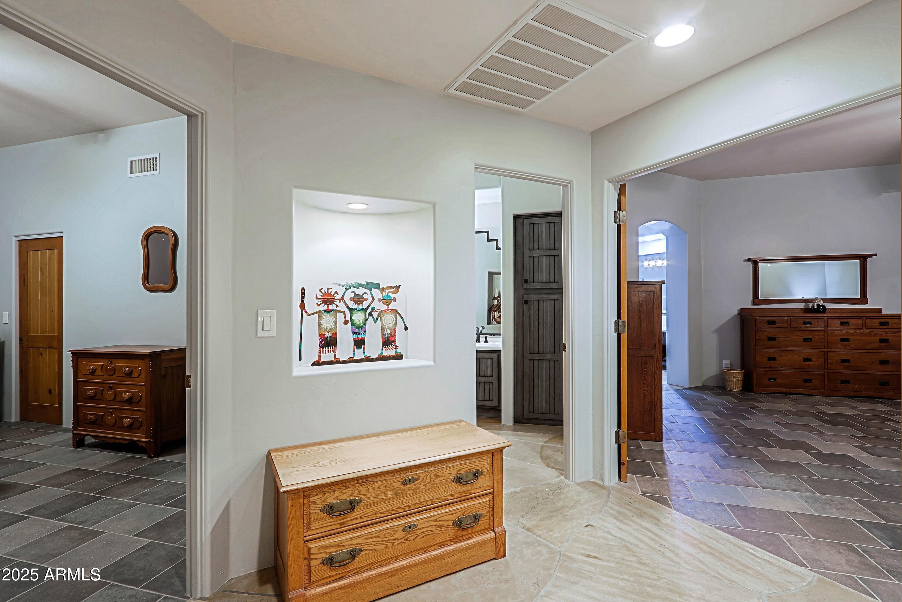 41840 North Spur Cross Road Cave Creek, AZ 85331 - Photo 56 of 67 a living room with furniture and a flat screen tv
