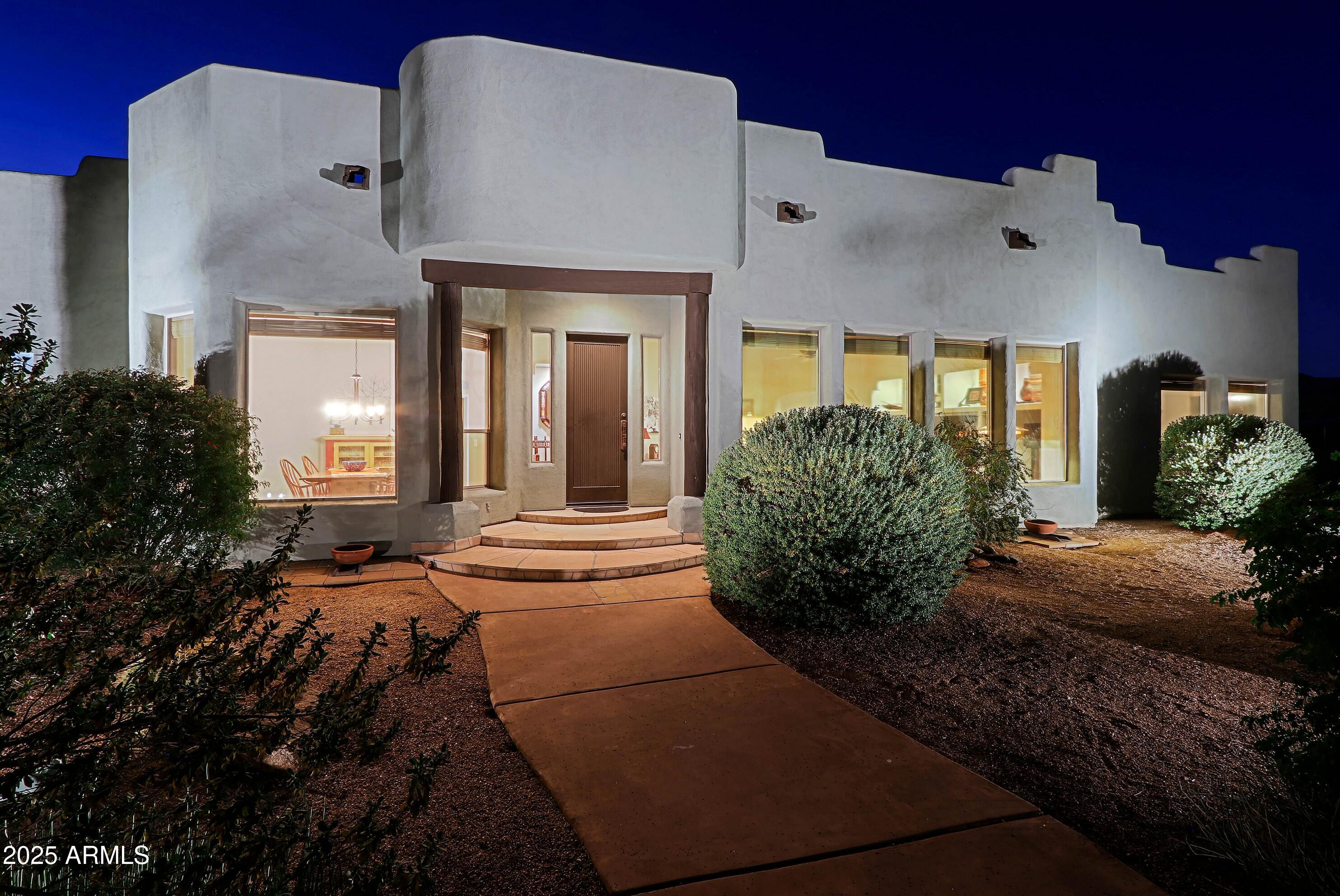 41840 North Spur Cross Road Cave Creek, AZ 85331 - Photo 8 of 67 a front view of a house with garden