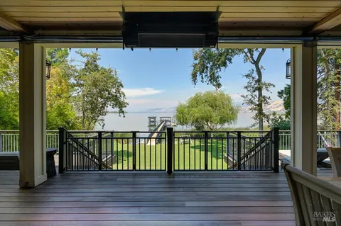 a media room with lots of chairs and a projector screen
