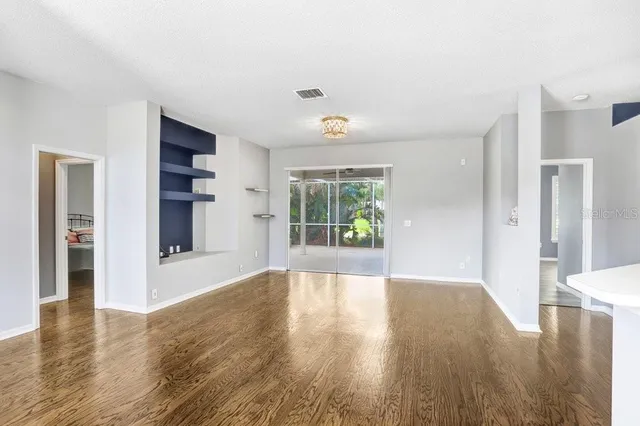 a view of livingroom with hardwood floor and window