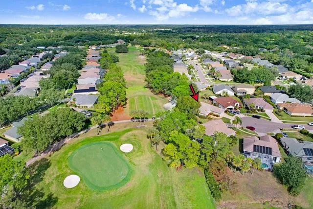 a view of a yard with basketball court