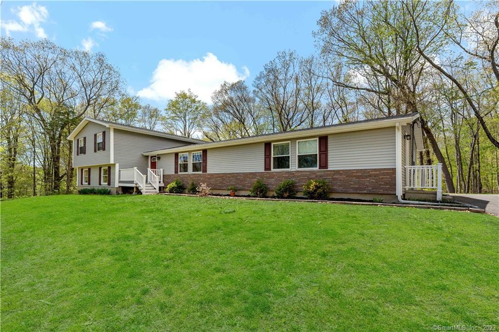 10 Caputo Road North Branford, CT 06471 - Photo 1 of 1 a front view of house with yard and green space