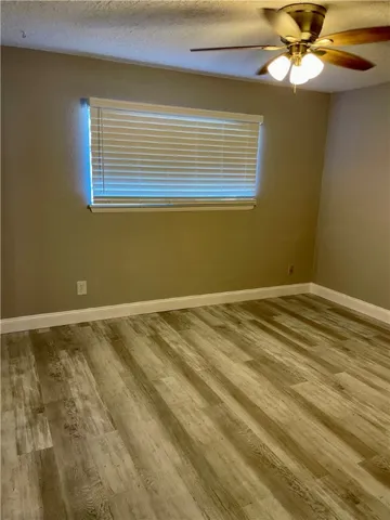 a kitchen with stainless steel appliances granite countertop a refrigerator sink and cabinets
