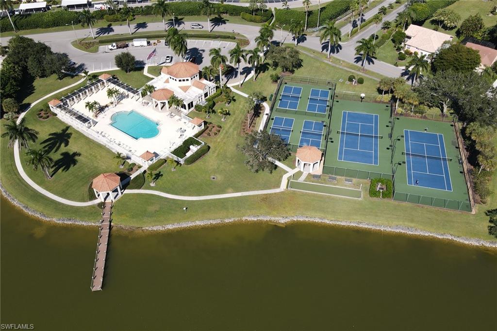 7791 Esmeralda Way, Unit L103 Naples, FL 34109 - Photo 31 of 46 a view of a swimming pool