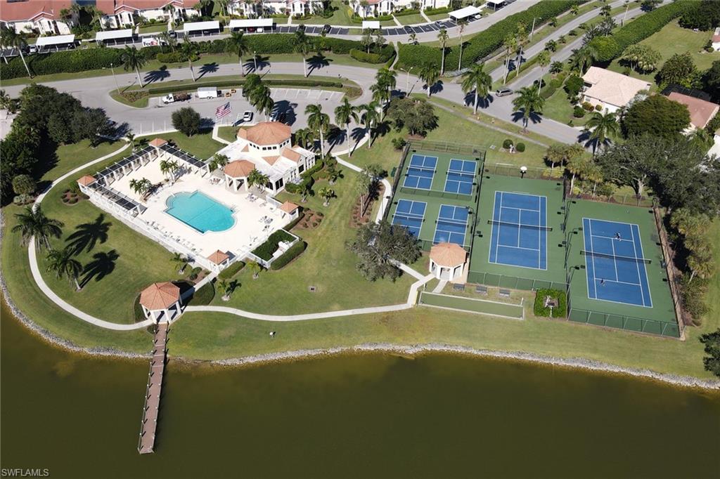 7791 Esmeralda Way, Unit L103 Naples, FL 34109 - Photo 34 of 46 a view of swimming pool
