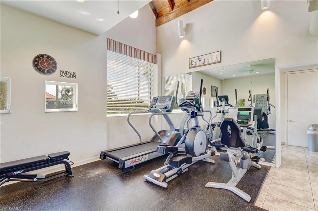 7791 Esmeralda Way, Unit L103 Naples, FL 34109 - Photo 38 of 46 a view of a room with gym equipment