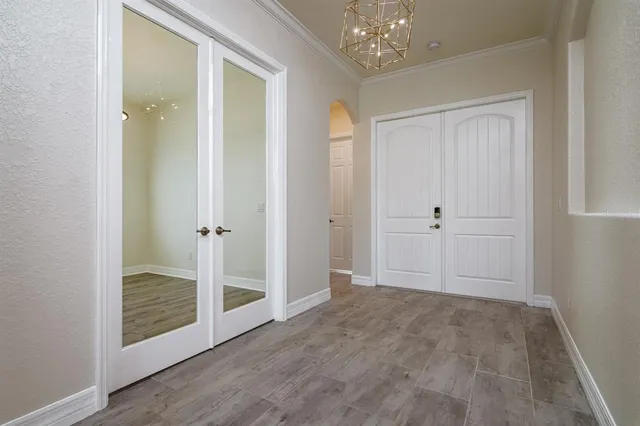 a view of entryway with chandelier