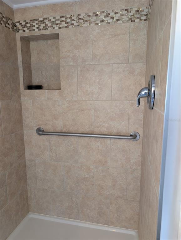 24514 Bonnet Road Astor, FL 32102 - Photo 31 of 37 a bathroom with a shower