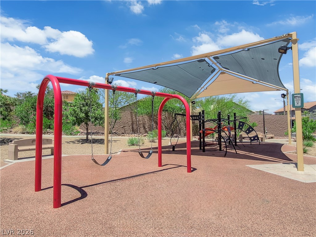 646 Monument Point Street Henderson, NV 89002 - Photo 39 of 44 A community playground, shaded from the sun, invites lively recreation.