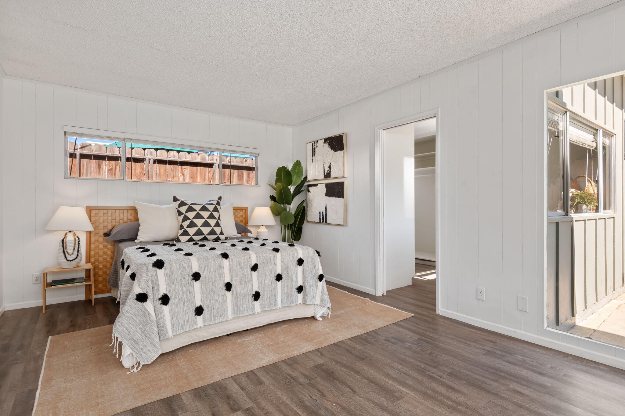 4612 Dean Drive Ventura, CA 93003 - Photo 13 of 33 a bedroom with a bed and window