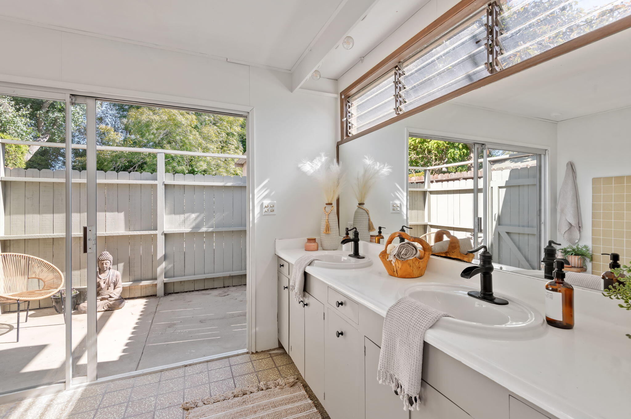 4612 Dean Drive Ventura, CA 93003 - Photo 16 of 33 a kitchen with a large window appliances and cabinets