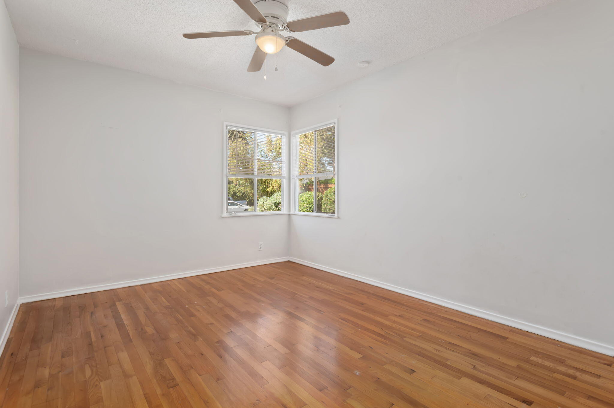 4612 Dean Drive Ventura, CA 93003 - Photo 24 of 33 wooden floor in an empty room with a window