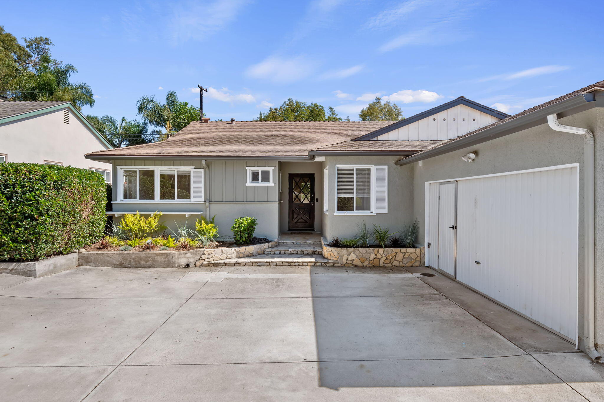 4612 Dean Drive Ventura, CA 93003 - Photo 3 of 33 front view of a house with a patio