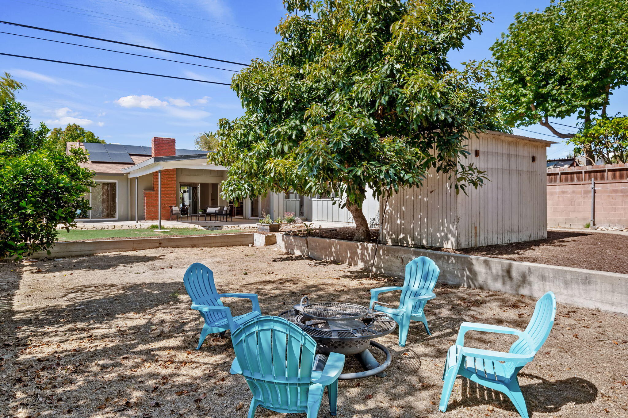 4612 Dean Drive Ventura, CA 93003 - Photo 31 of 33 a view of a house with backyard water fountain and sitting area