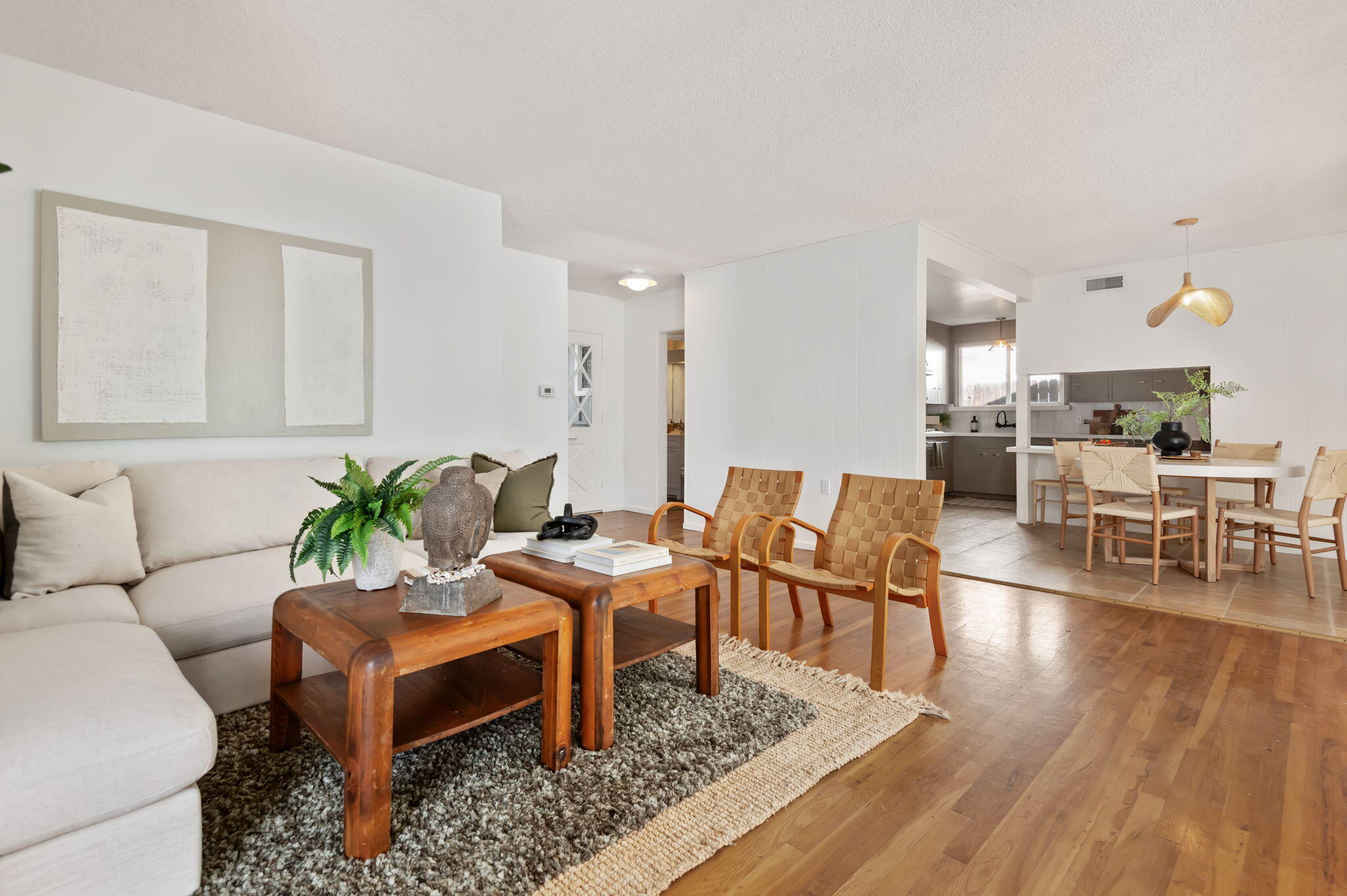 4612 Dean Drive Ventura, CA 93003 - Photo 6 of 33 a living room with furniture wooden floor and a chandelier