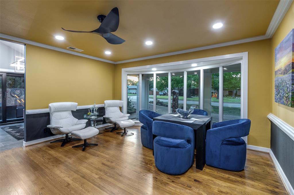 6566 Ridgeview Circle Dallas, TX 75240 - Photo 19 of 39 a living room with furniture and a large window