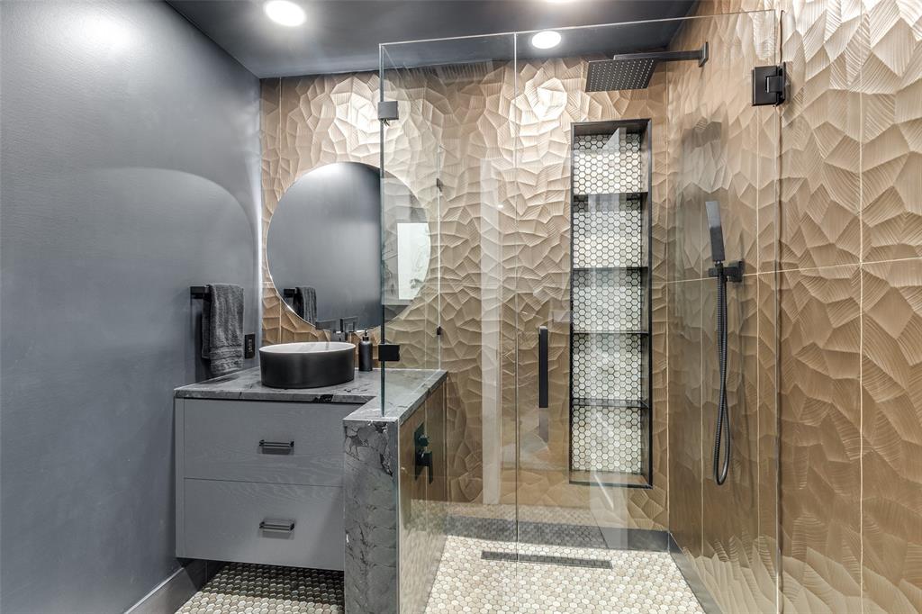 6566 Ridgeview Circle Dallas, TX 75240 - Photo 29 of 39 a bathroom with a sink and mirror