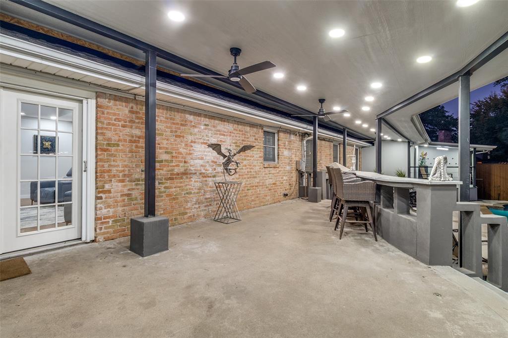 6566 Ridgeview Circle Dallas, TX 75240 - Photo 31 of 39 a view of a big room with furniture and a large window