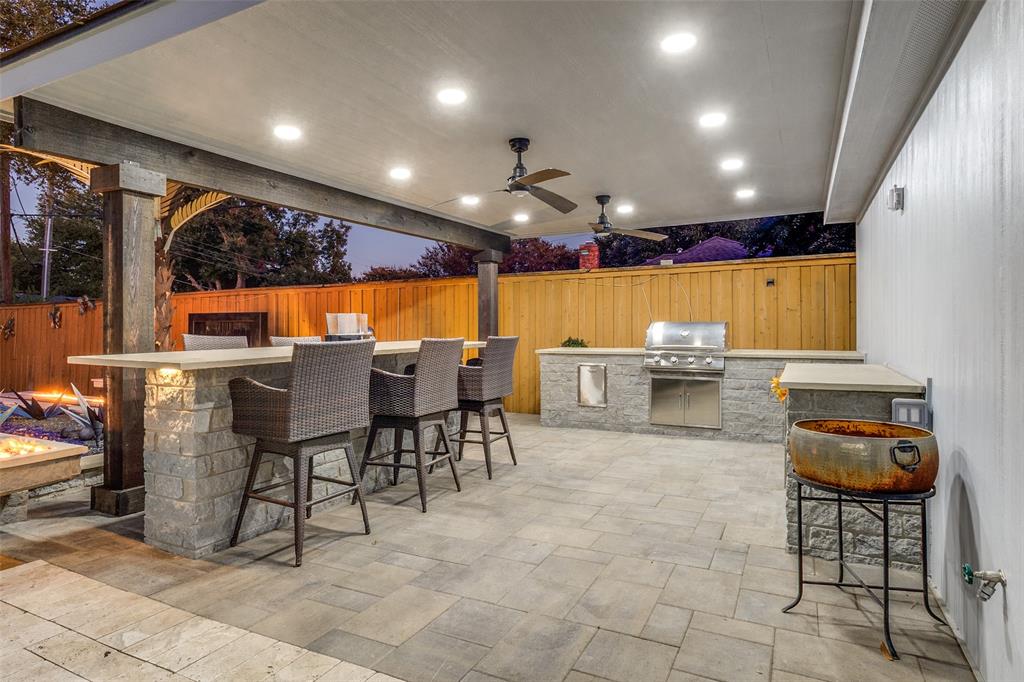 6566 Ridgeview Circle Dallas, TX 75240 - Photo 33 of 39 a view of a big dining room with furniture