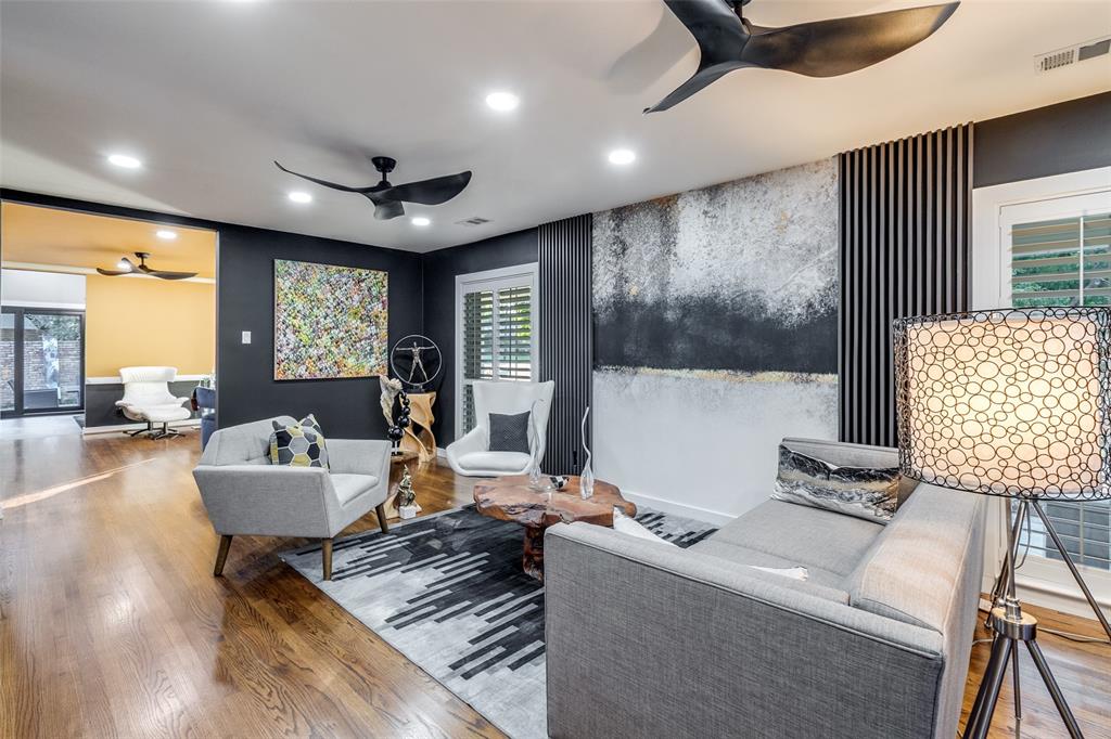 6566 Ridgeview Circle Dallas, TX 75240 - Photo 4 of 39 a living room with furniture and a large window
