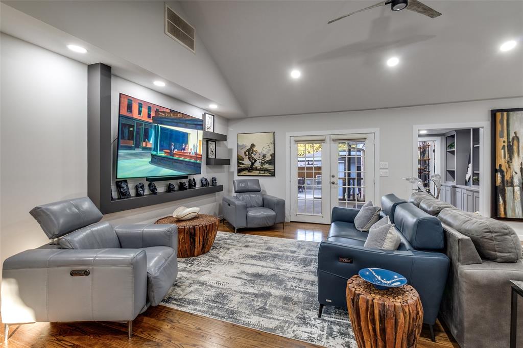 6566 Ridgeview Circle Dallas, TX 75240 - Photo 7 of 39 a living room with furniture and a flat screen tv