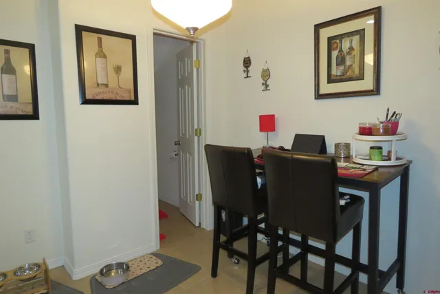 a view of a dining room with furniture