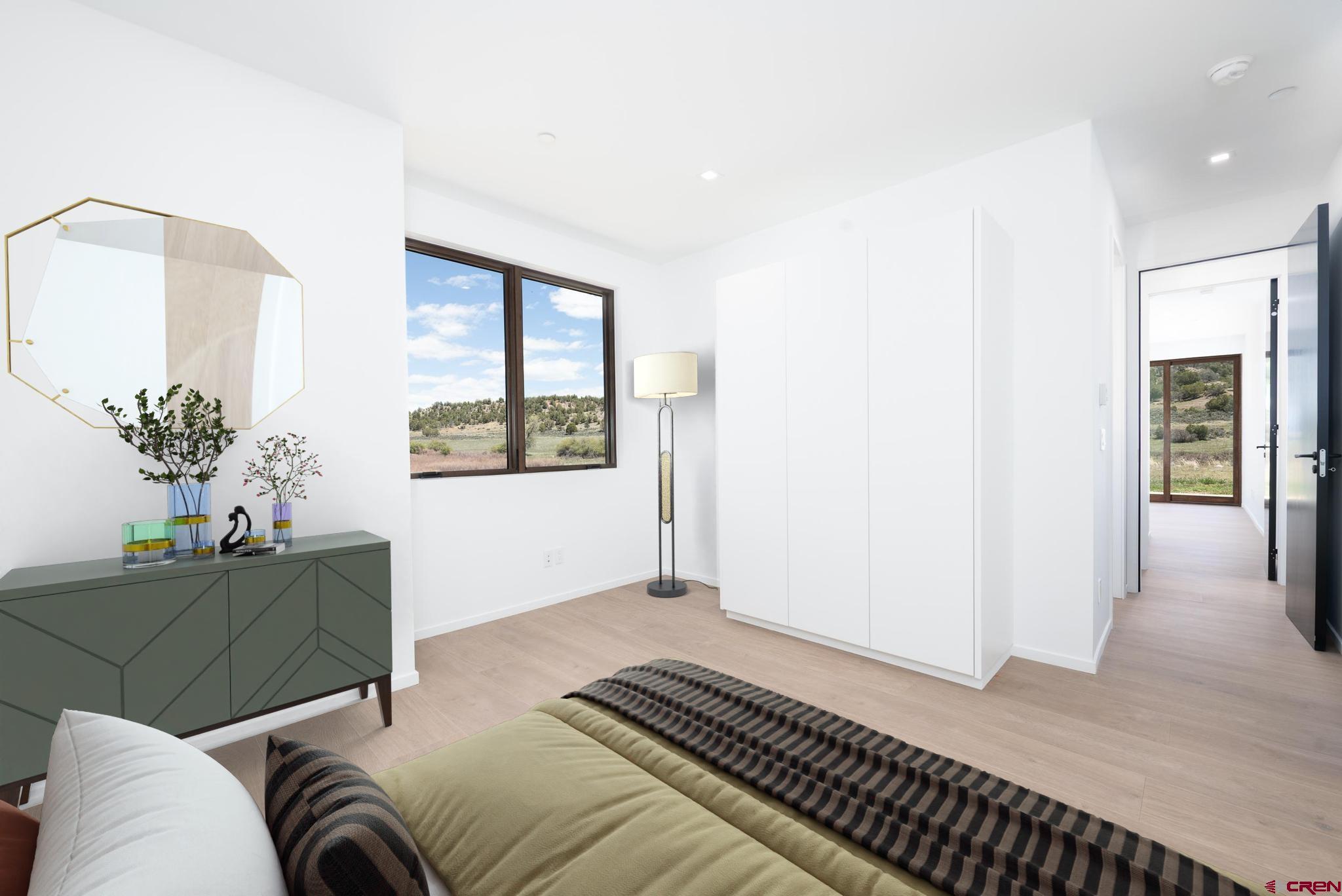 201 Cowboy Trail Durango, CO 81303 - Photo 25 of 45 a living room with furniture and a window