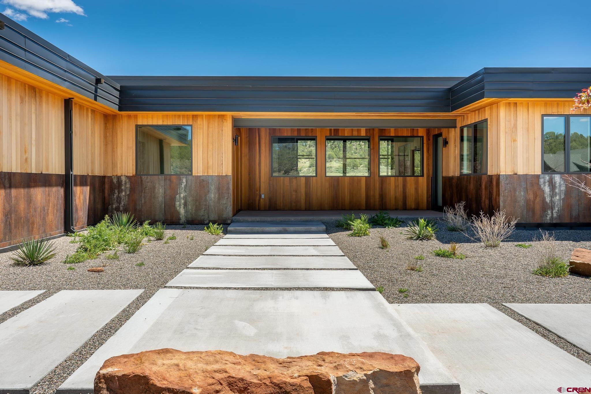 201 Cowboy Trail Durango, CO 81303 - Photo 35 of 45 a front view of a house