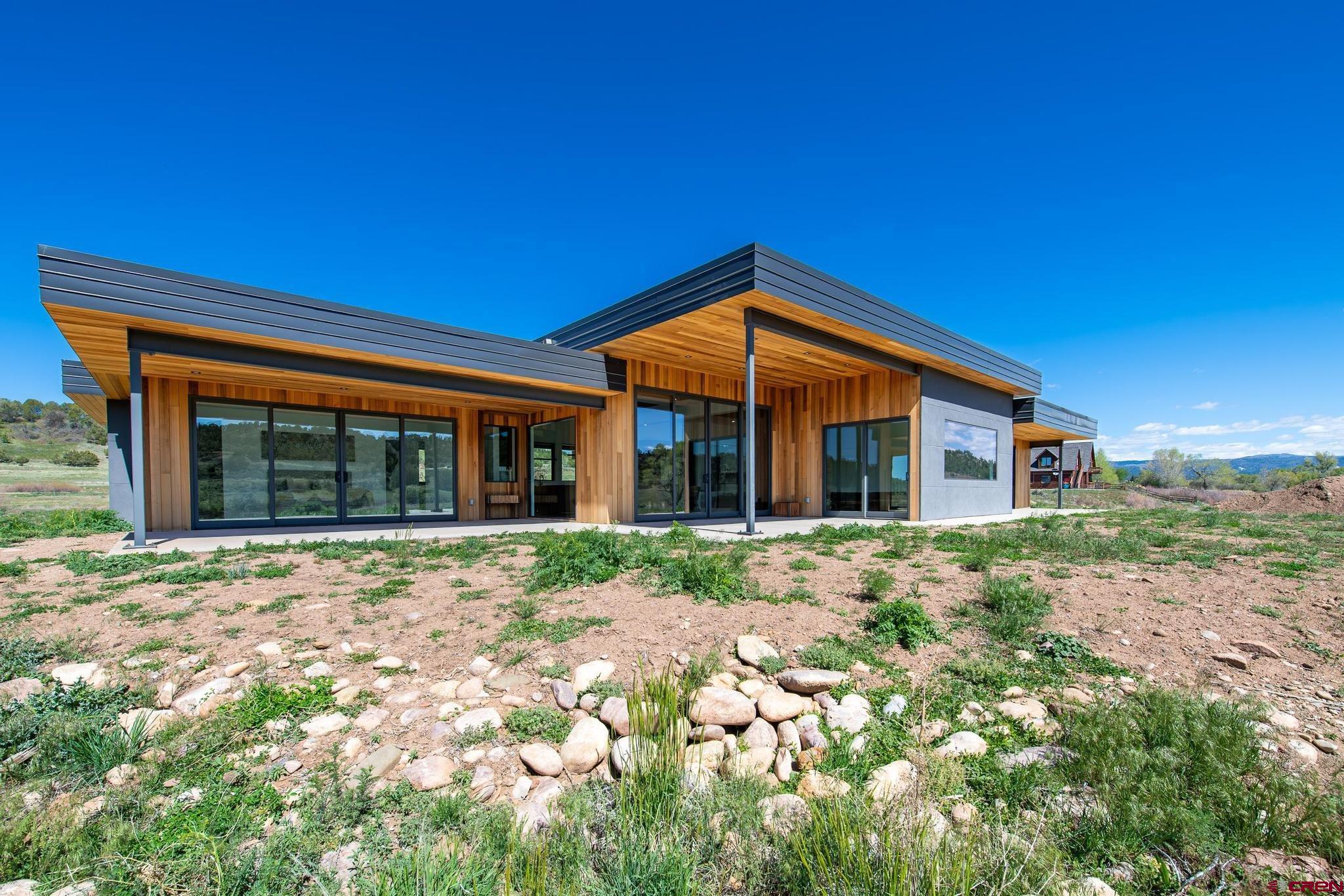 201 Cowboy Trail Durango, CO 81303 - Photo 36 of 45 a view of a house with a yard