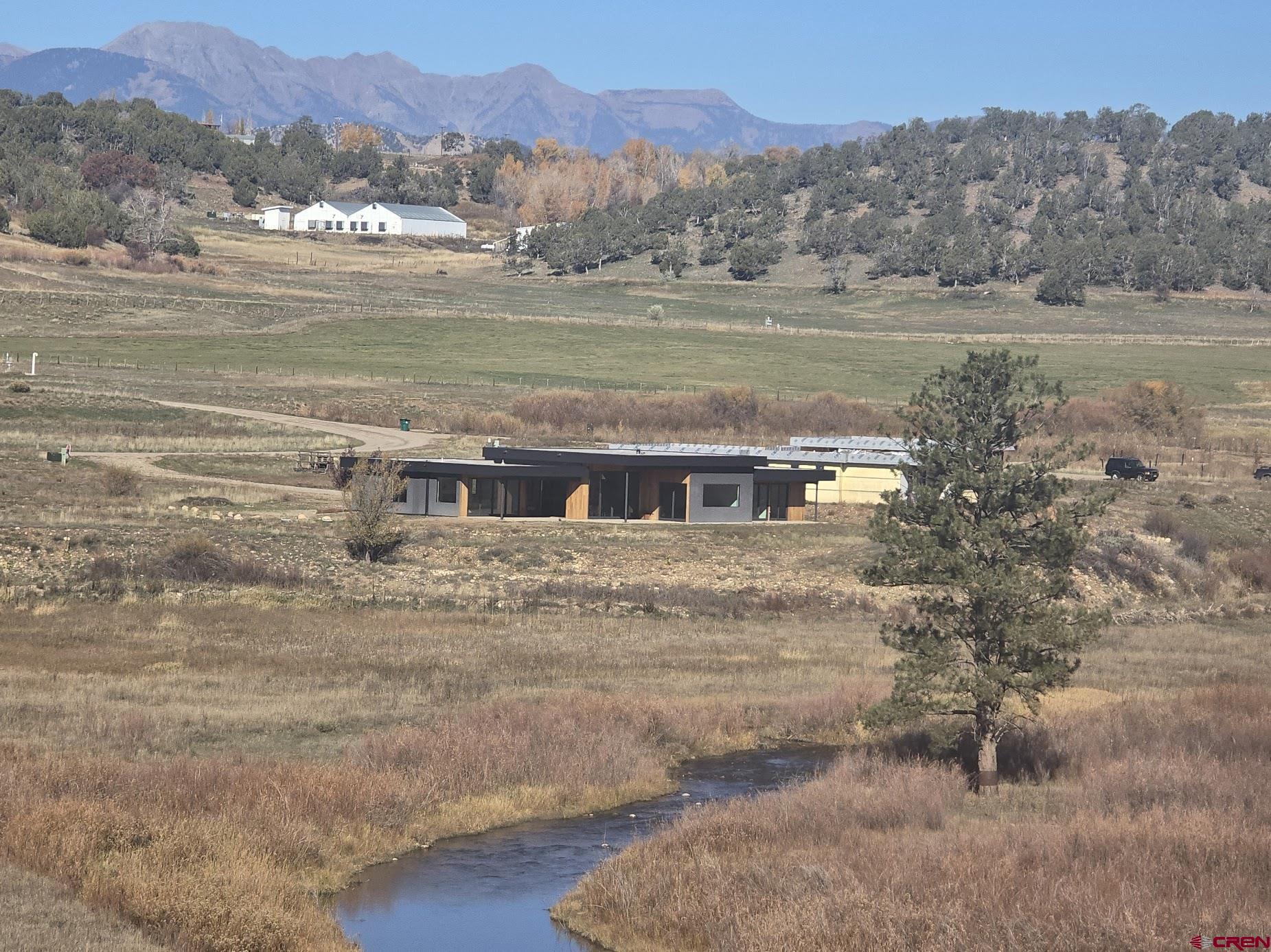 201 Cowboy Trail Durango, CO 81303 - Photo 43 of 45 a view of a house with a yard