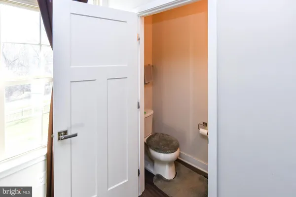 a kitchen with a table and chairs in it