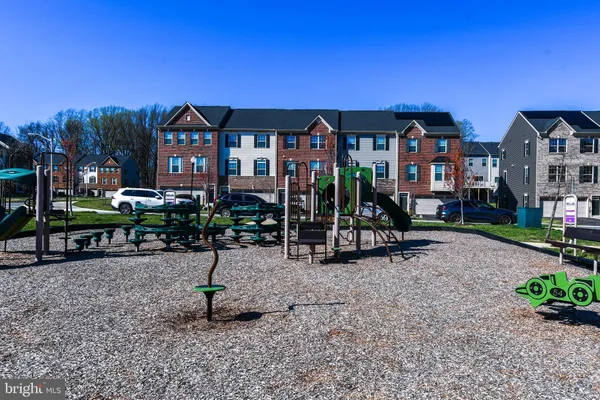 a view of a park with swings