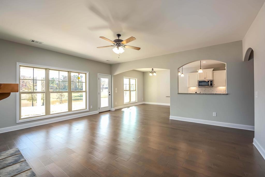 302 Walker Road Cataula, GA 31804 - Photo 4 of 25 OPEN GREAT ROOM WITH LOTS OF WINDOWS