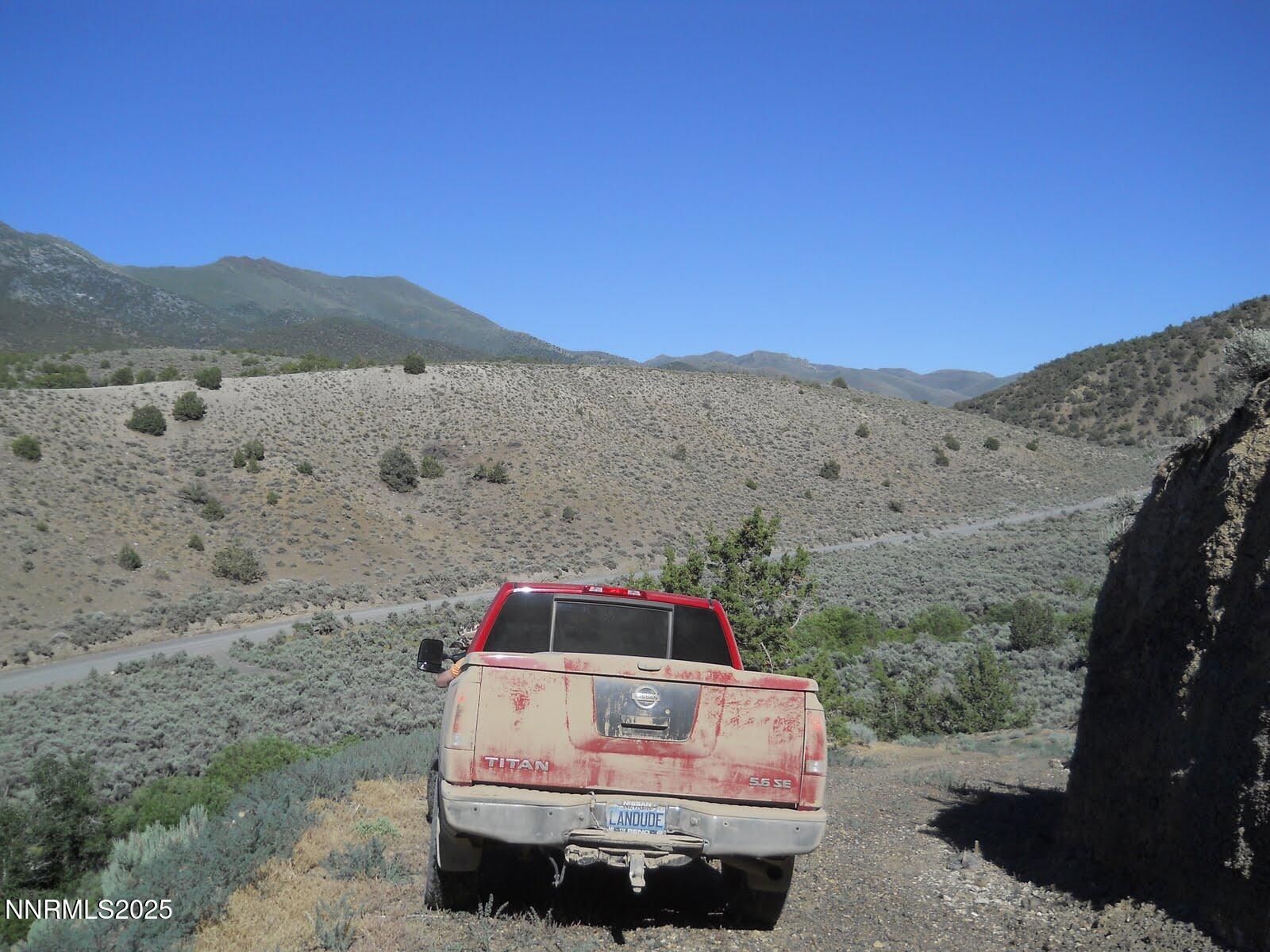 8210 Ml Crk Road Battle Mountain, NV 89820 - Photo 24 of 25 a car parked in front of a road