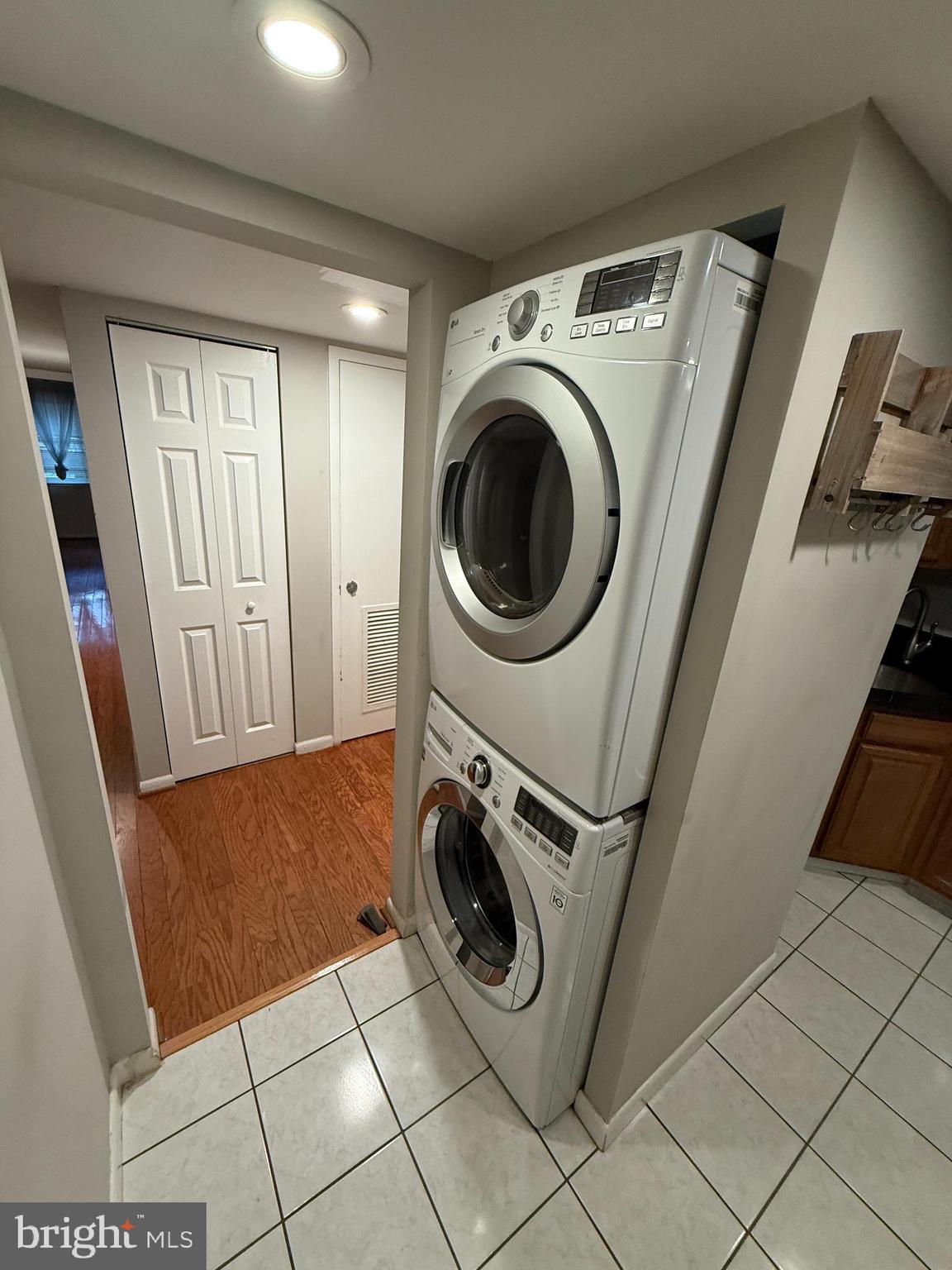 1404 Northgate Square, Unit 4/12B Reston, VA 20190 - Photo 6 of 10 a utility room with dryer and washer