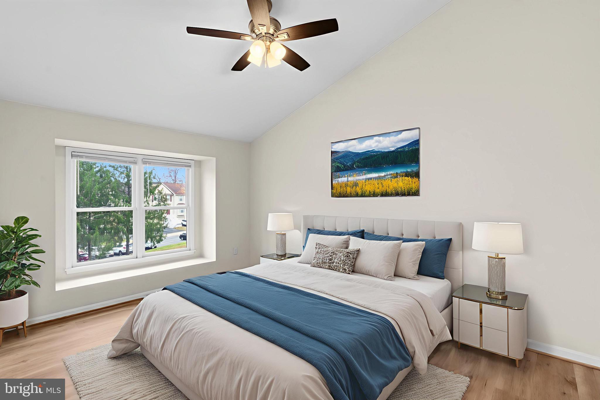 13920 Baton Rouge Court Centreville, VA 20121 - Photo 21 of 45 a bedroom with a large bed and a window