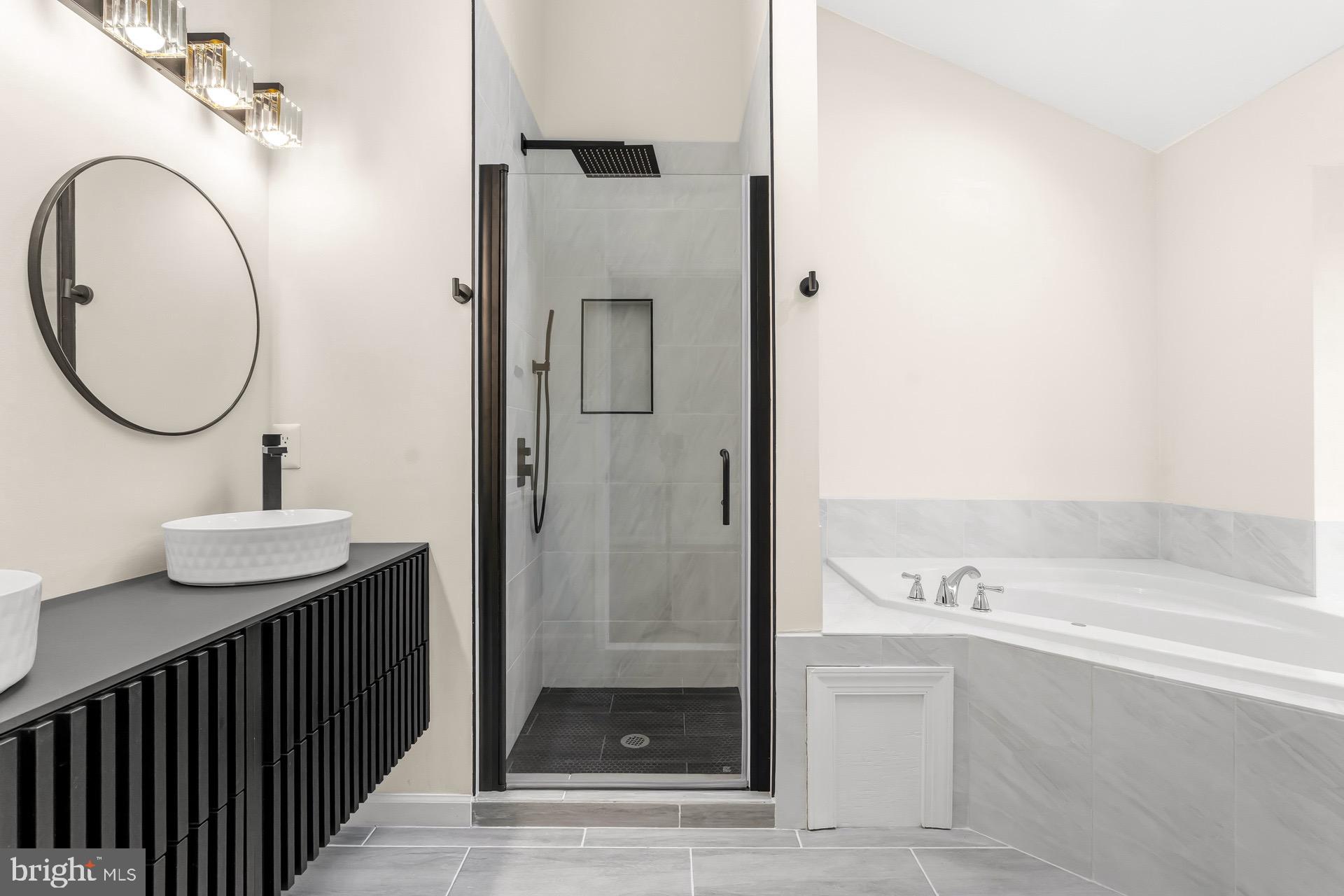 13920 Baton Rouge Court Centreville, VA 20121 - Photo 23 of 45 a bathroom with a sink and a mirror
