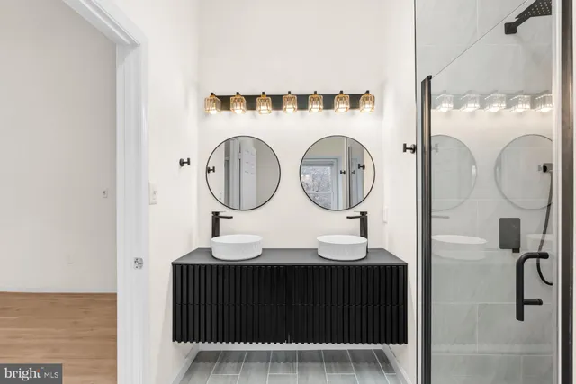 a bathroom with a toilet a sink and a bathtub