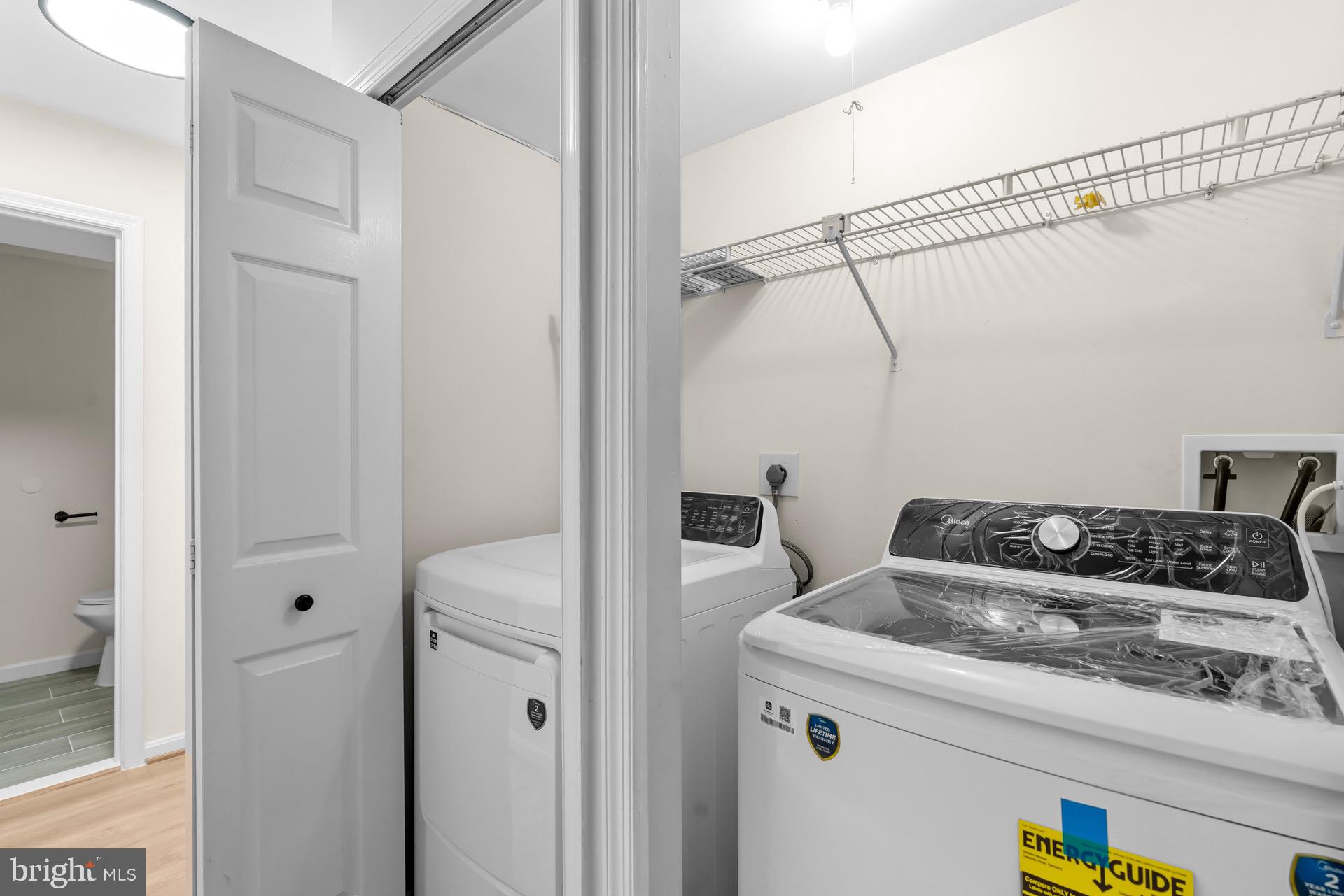 13920 Baton Rouge Court Centreville, VA 20121 - Photo 39 of 45 a utility room with dryer and washer
