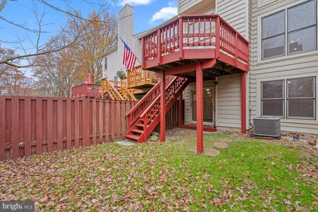 a front view of a house with many windows