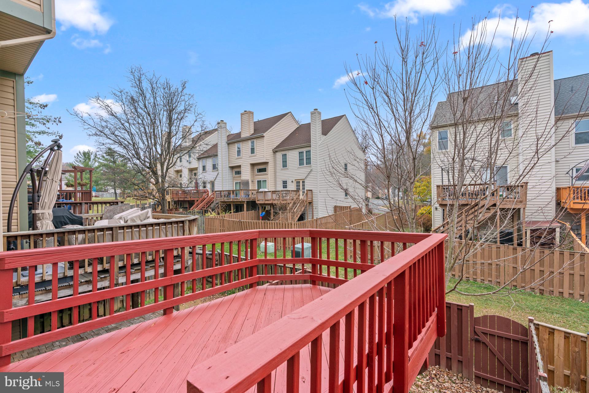 13920 Baton Rouge Court Centreville, VA 20121 - Photo 43 of 45 a view of a balcony with tall trees