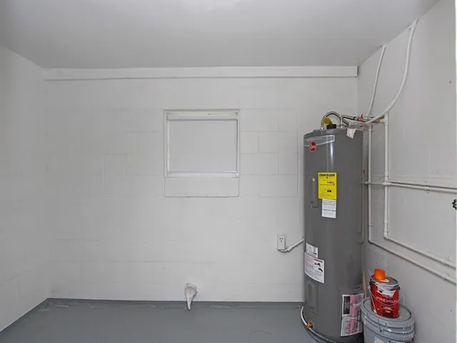 a bathroom with a shower and a toilet