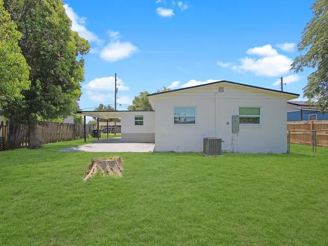 a view of a backyard with a garden