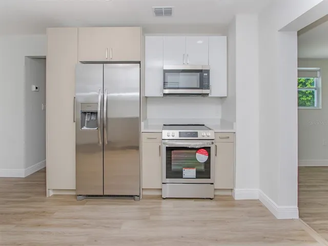 a utility room with washer and dryer
