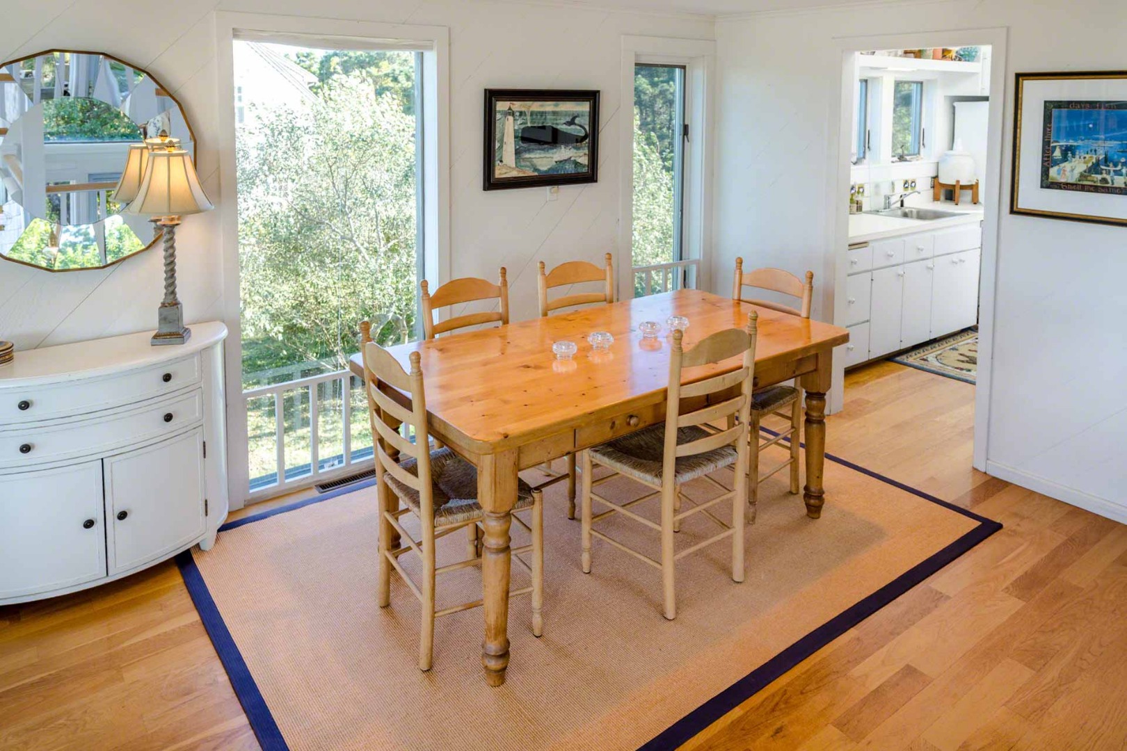 24 Manaca Hill Road Edgartown, MA 02539 - Photo 14 of 34 a view of a dining room with furniture window and wooden floor
