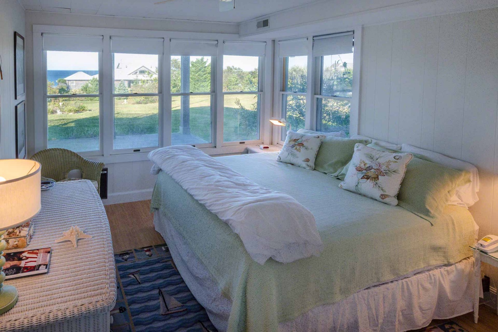24 Manaca Hill Road Edgartown, MA 02539 - Photo 16 of 34 a bedroom with bed and glass window