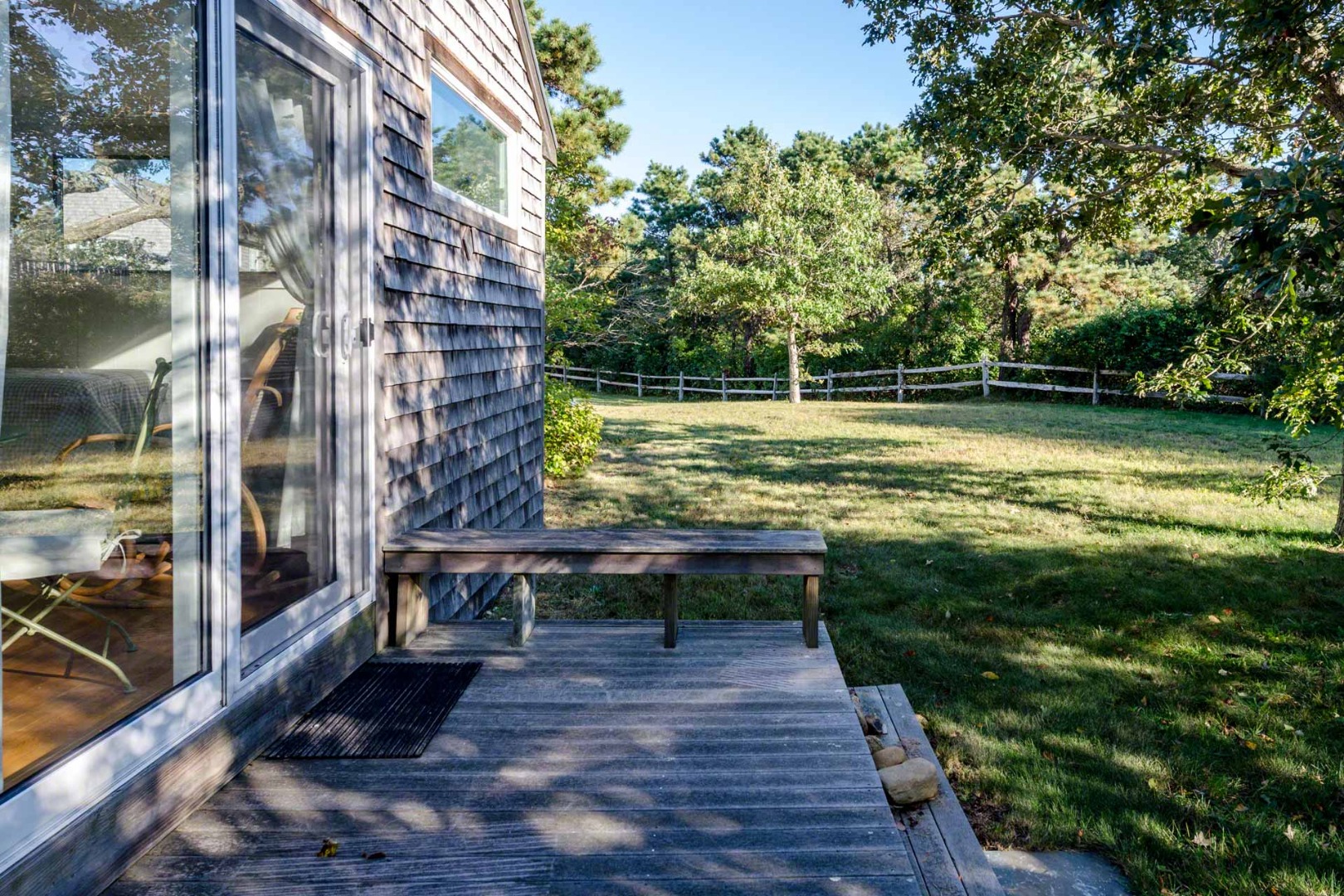 24 Manaca Hill Road Edgartown, MA 02539 - Photo 28 of 34 a view of a swimming pool with a patio