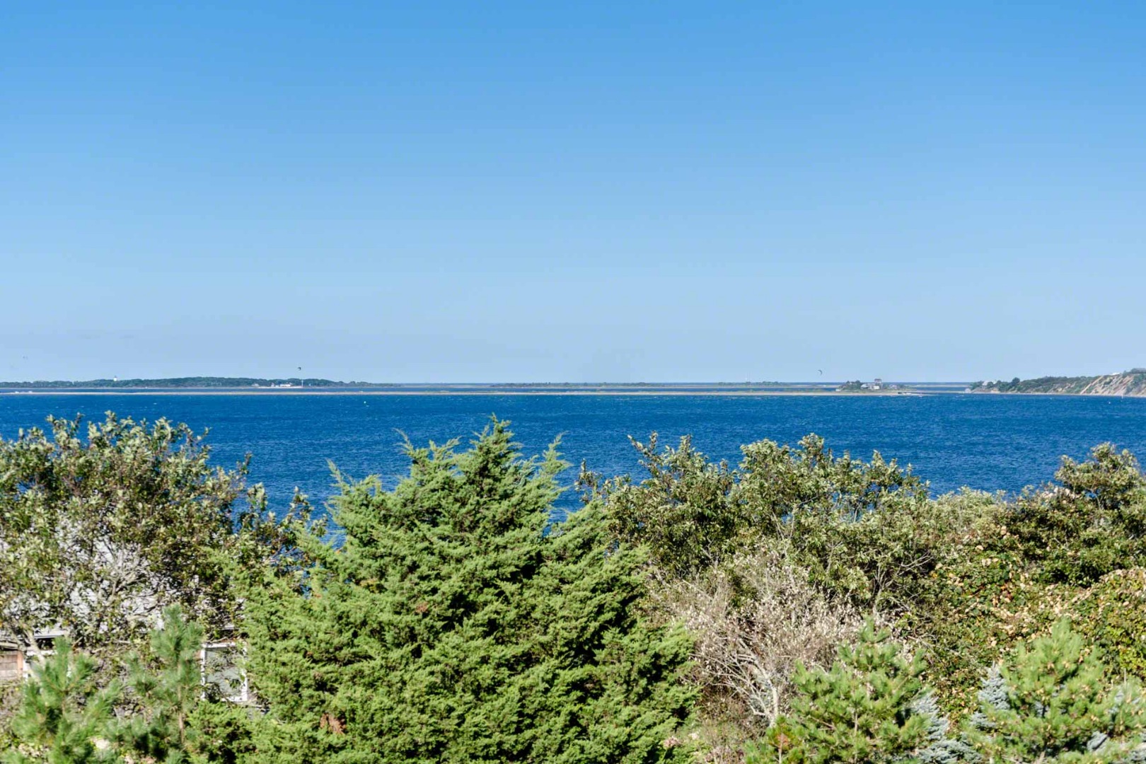 24 Manaca Hill Road Edgartown, MA 02539 - Photo 30 of 34 an aerial view of a houses with a yard