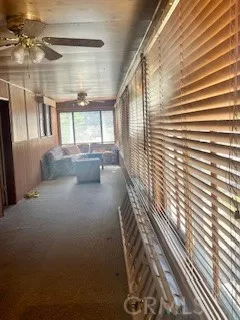 a view of a room with windows